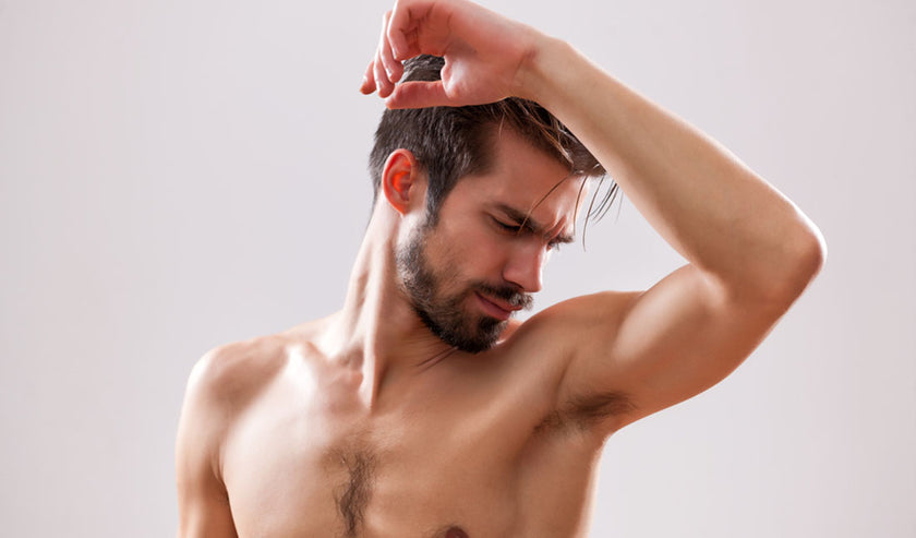 man smelling armpit man smelling armpit